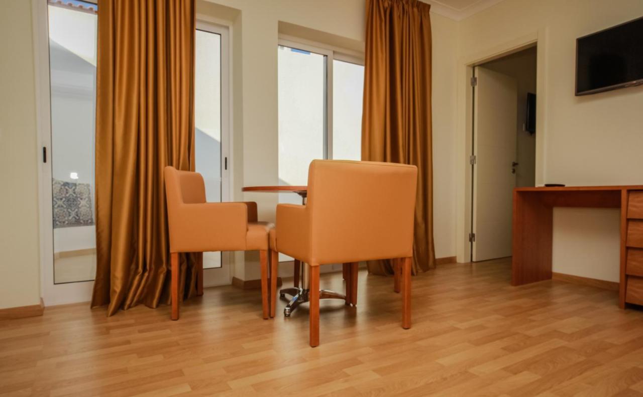 Lagoa Hotel Habitación foto